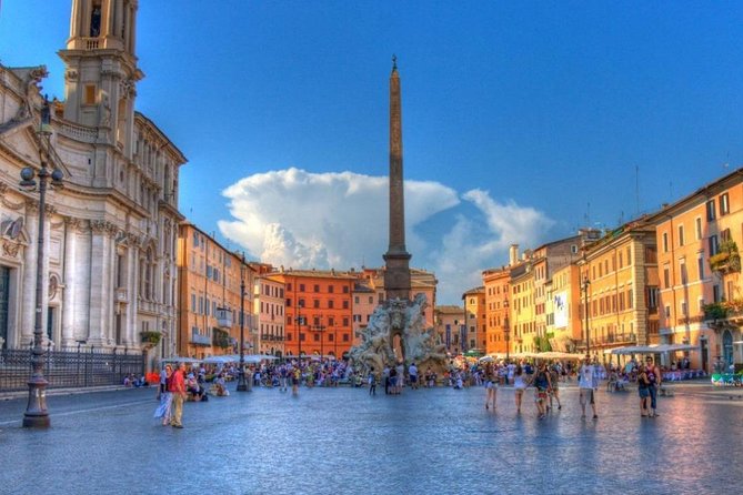 3 in 1 Cooking Class near Navona: Fettuccine, Ravioli & Tiramisu - Wine, the sit-down meal, and finishing with limoncello or coffee