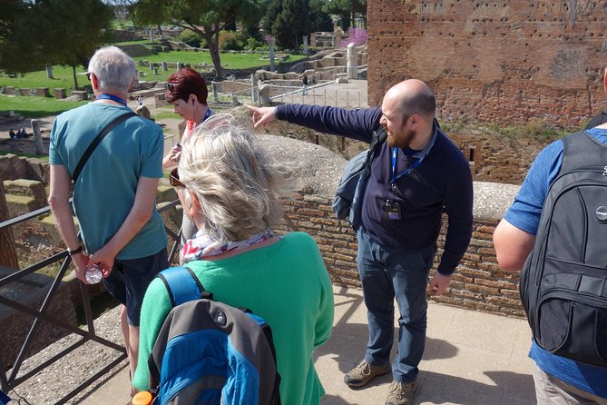 Ancient Ostia Antica Semi-Private Day Trip from Rome by Train with Guide - Baths of Neptune and mosaics: where Roman comfort shows up
