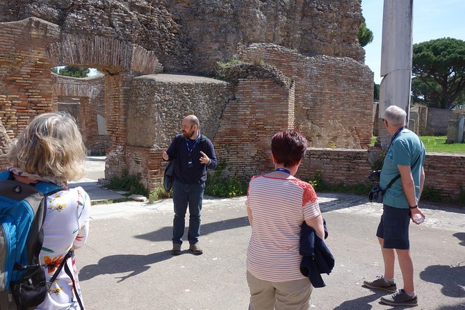 Ancient Ostia Antica Semi-Private Day Trip from Rome by Train with Guide - Forum spaces, temples, and everyday buildings you can actually imagine