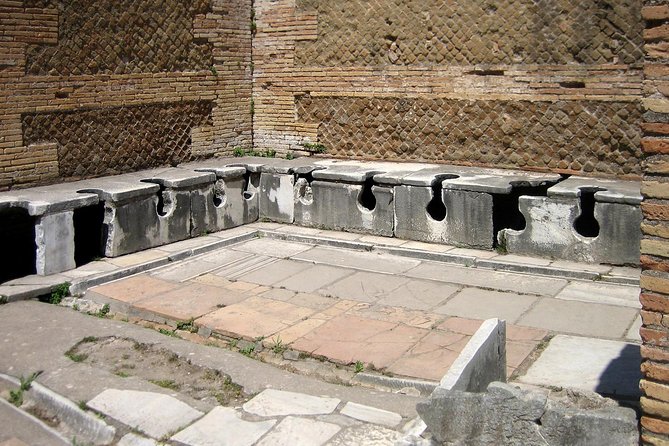 Ancient Ostia from Rome: Archaeology & History, Semi-Private Tour - Baths of Neptune: mosaics, sea horses, and how Romans cooled off