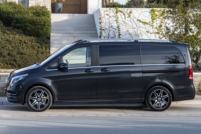 Arrival Transfer: Fiumicino Airport FCO to Rome by Luxury Van - FCO Meet-and-Greet That Saves Your First 20 Minutes
