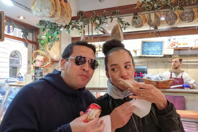 Budget-friendly Street Food Tour of Trastevere Quarter Smaller Group - Piazza Santa Maria in Trastevere: supplì and a pizza shop classic