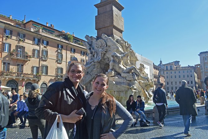 Campo dei Fiori Market and Trevi Fountain District Food & Wine Tour in Rome - Trevi Fountain coin toss and a clean finish near the landmarks