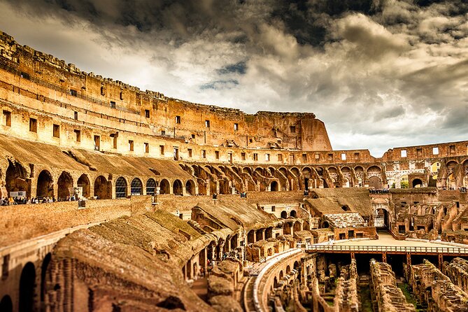 Colosseum and Palatine Hill: Unveil Rome’s Ancient Spectacles - Entering the Colosseum: Flavian Amphitheater in plain view