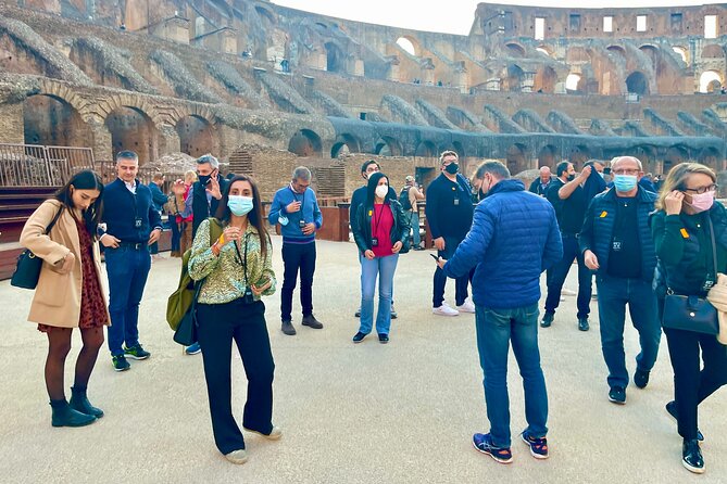 Colosseum Arena & Roman Forum Guided Tour - Roman Forum After the Arch of Titus: Sacred Way to Imperial Temples