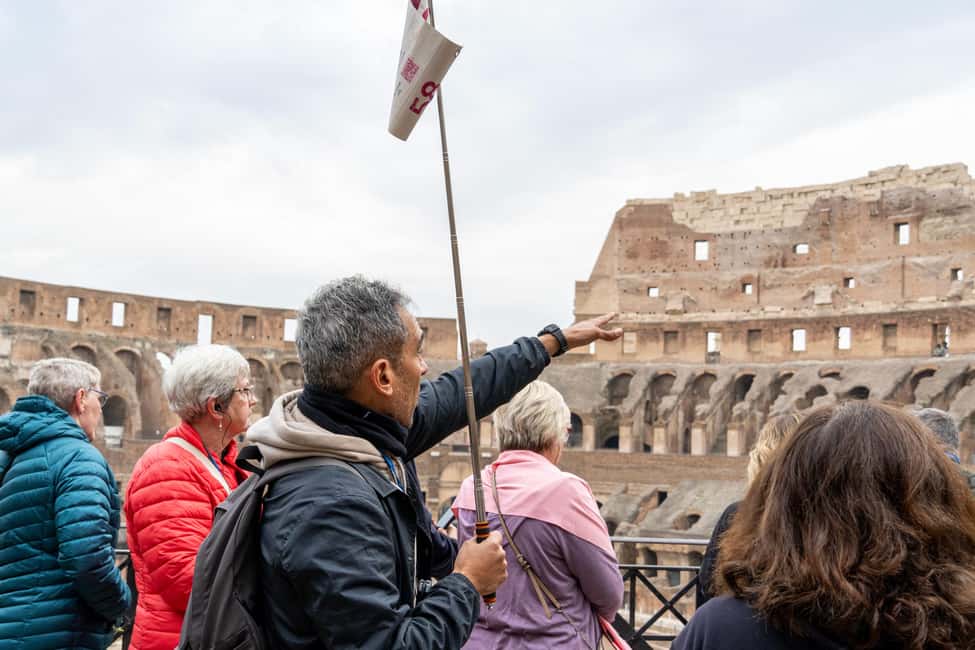 Colosseum Guided Tour: Hotel Transport included - Entering the Colosseum on levels 1 and 2
