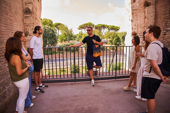 Colosseum, Palatine Hill and Roman Forum Group Tour - Via Sacra (Sacred Way): Walk the Same Stones of Triumph