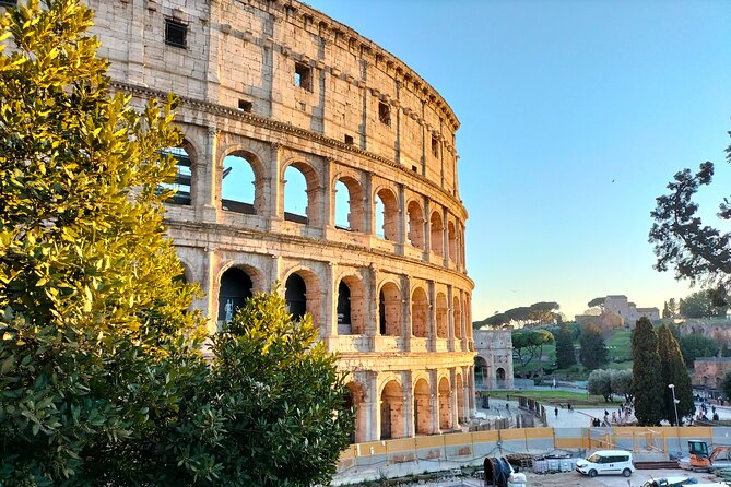 Colosseum, Roman Forum and Palatine Hill Guided Walking Tour - Entering the Colosseum: group access, tiers, and the best photo moments