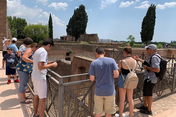 Colosseum Tour with Palatine Hill and Roman Forum - Entering the Colosseum: Timed, Guided, and Built to Explain