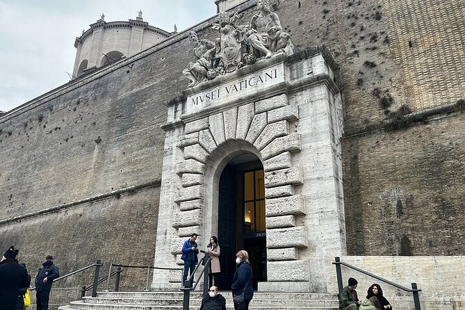 Colosseum with Arena and afternoon Vatican Museums Tour - Entering the Colosseum arena: gladiator gate access and live guide talk