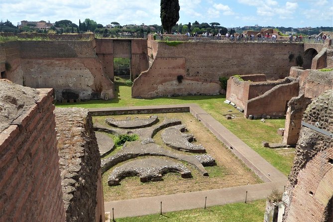 Discover Rome: Colosseum, Forum & Palatine Hill with Arena Option - Stop 2: Roman Forum orientation on the Via Sacra