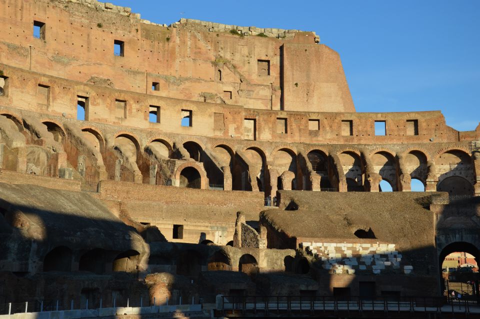 Explore Colosseum and Roman Forum with an Archaeologist - Arches and the route through Rome’s layers
