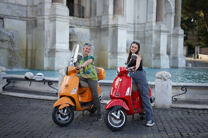 Explore Rome on a Vespa: Uncover the City's Hidden Gems - Passing Circus Maximus: A Big Roman Space in Modern Day Form
