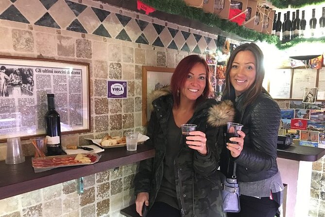 Food and Wine tour: Ghetto & Trastevere Culinary Adventure - Il Portico Di Ottavia: tasting while you read the street scene
