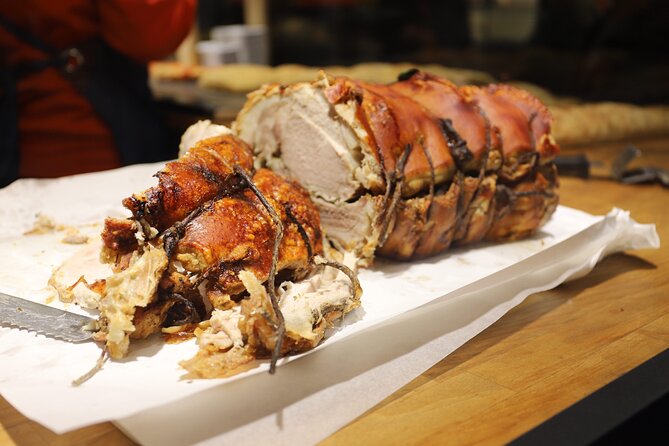 Food & Wine Tour by Golf Cart: taste and explore - Testaccio market bites: parmigiano, prosciutto, and Roman porchetta
