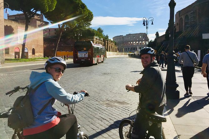 Gems of Rome: Small group E-bike tour with street food stops - Riding Toward the Roman Forum Views: Piazza del Campidoglio’s Big Moment