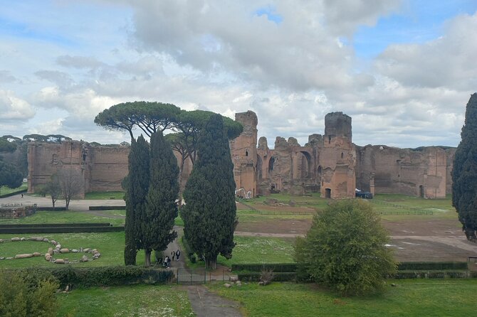 Golf Cart Driving Tour in Rome: 2.5 hrs Catacombs & Appian Way - Aurelian Walls and the Pyramid of Caius Cestius: small stops, big mood shifts