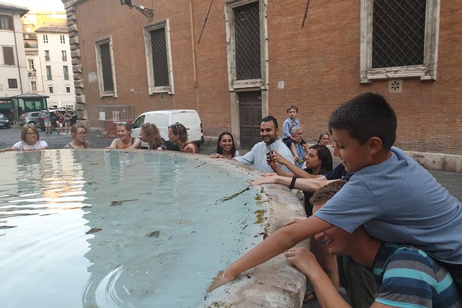 Guided Walking Tour of Rome: Top Sights & Baroque Treasures - Trevi Fountain: time for photos, coins, and the fun part of the crowd