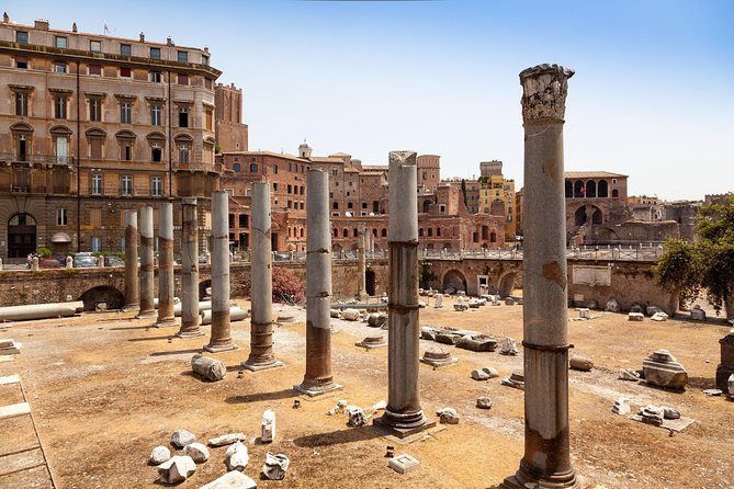 Imperial Rome Including Colosseum with Roman Forum and Palatine Hill Tour - Entering The Colosseum: built by Vespasian, explained by your guide