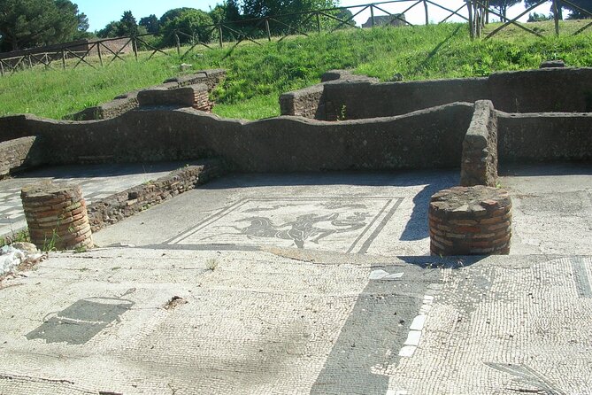 Ostia Antica - We give emotions - The guided walk through late antiquity: mosaics, baths, shops, and temples