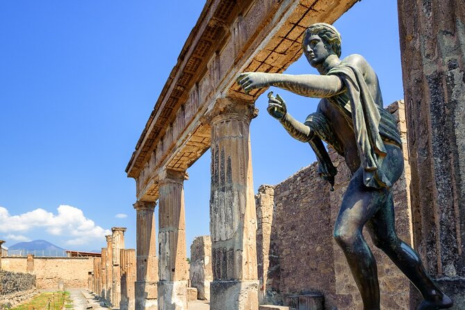 Pompeii Day Tour by Train from Rome with Cooking Class & Lunch - Inside Pompeii: bakeries, baths, shops, brothels, and the casts