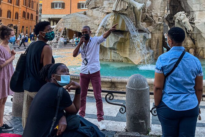 Private Evening Walk: Wonders of Rome in English or Spanish - Trevi Fountain at night: traditions you can actually understand