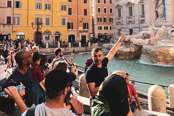 Private Exclusive Rome Walking Tour in English or Spanish - Trevi Fountain in warm evening light: photos and myth without the rush