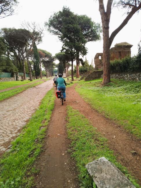 Rome: Appian Way & Catacomb Sunset E-bike Tour with Aperitif - Parco degli Acquedotti at sunset: the aqueducts become the main event