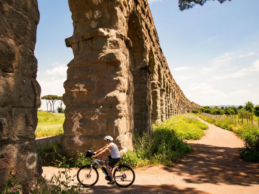 Rome: Appian Way, Catacombs & Roman Aqueducts Top EBike Tour - Parco degli Acquedotti: aqueduct arches with real scale