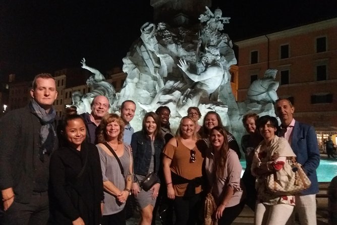 Rome by Night Walking tour Including Piazza Navona Pantheon and Trevi Fountain - Trevi Fountain at night: coin wish, but also crowd control