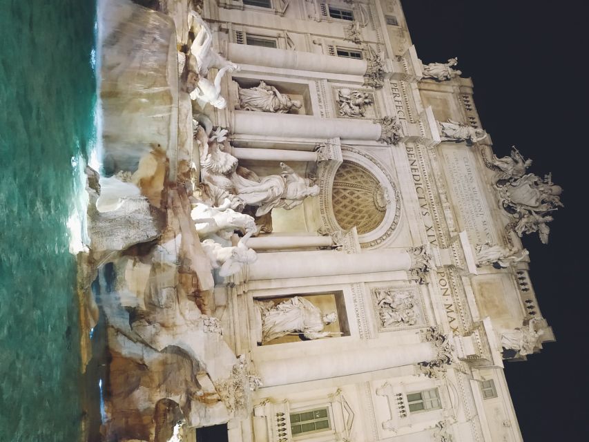 Rome: City Highlights Small Group Walking Tour by Night - The walk to the Colosseum: final stretch, big payoff
