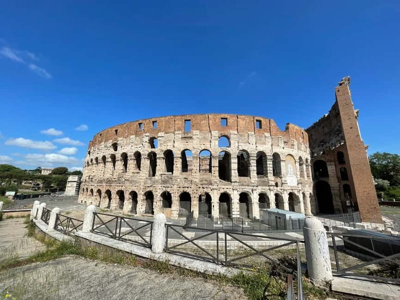 Rome: Colosseum and Ancient Rome Small Group Guided Tour - Between arena and ruins: the quick walk that sets up context