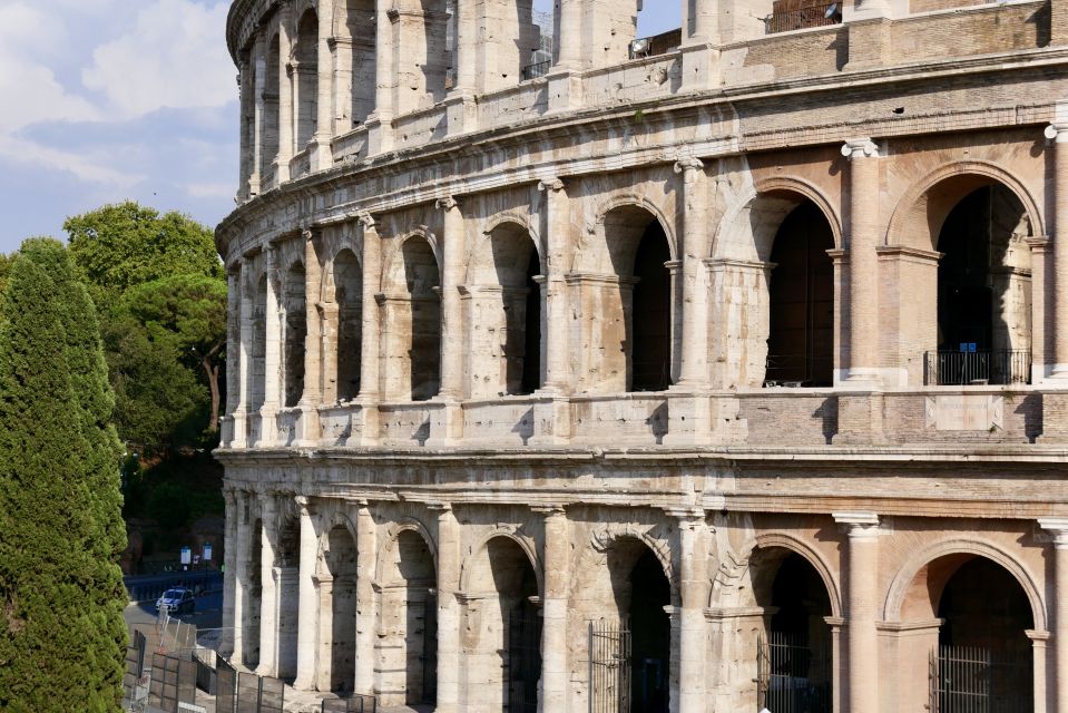 Rome: Colosseum Arena Guided Tour with Roman Forum Option - Porta Libitinaria and Engineering Stories You’ll Actually Remember