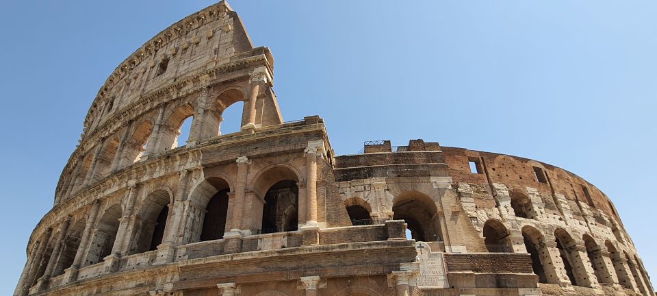Rome: Colosseum, Circus Maximus, Forum & Ancient Rome Tour - Climbing Capitoline Hill toward Michelangelo’s square