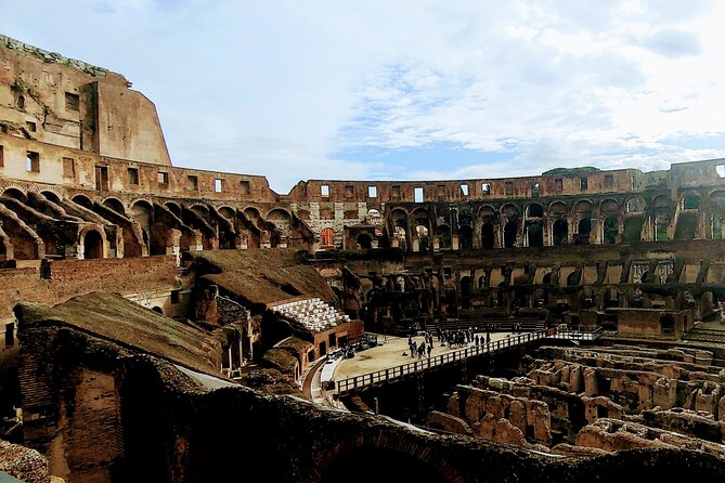 Rome: Colosseum Guided Tour with Roman Forum and Palatine Hill - Entering the Colosseum: one guided hour, with audio headsets