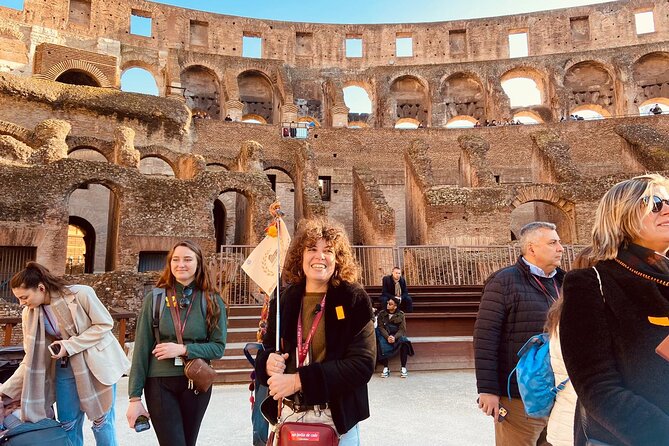 Rome: Colosseum, Roman Forum & Palatine Hill Guided Tour - Starting at the Arch of Constantine: Meeting Point and First Minutes