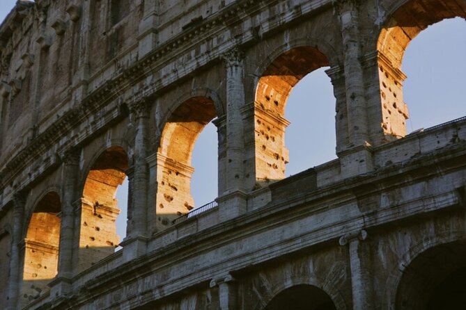 Rome Colosseum, Roman Forum & Palatine Official Visit - Meeting Point Reality Check: Piazza del Colosseo and the Black Flag at the Arch of Constantine