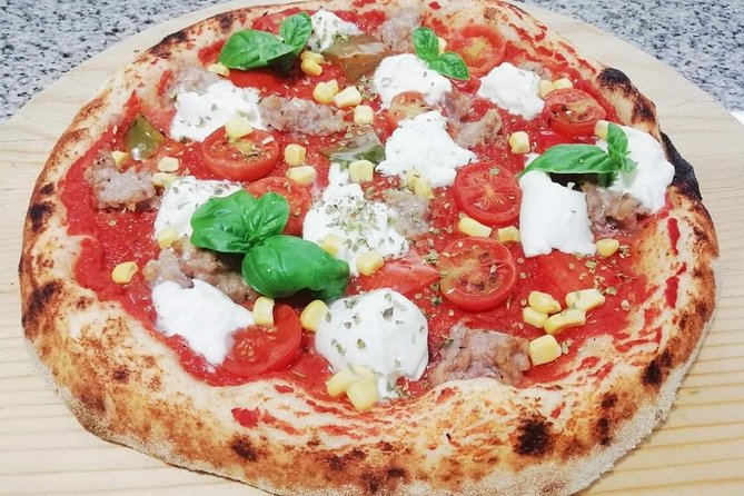 Rome Cooking Class: Make Pizza and Pasta with Wine & Dessert - Your meal in the garden: wine, water, and everything you made
