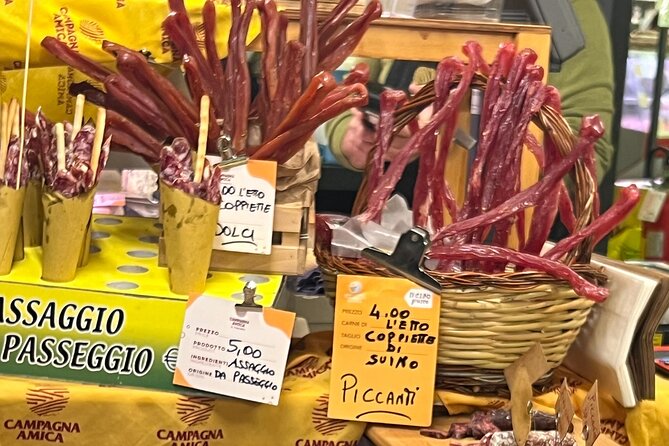 Rome E-Bike Tour: Ultimate Street Food and Market Feast - The 1-hour market feast: olive oil, wine, cured meats, cheese, and more