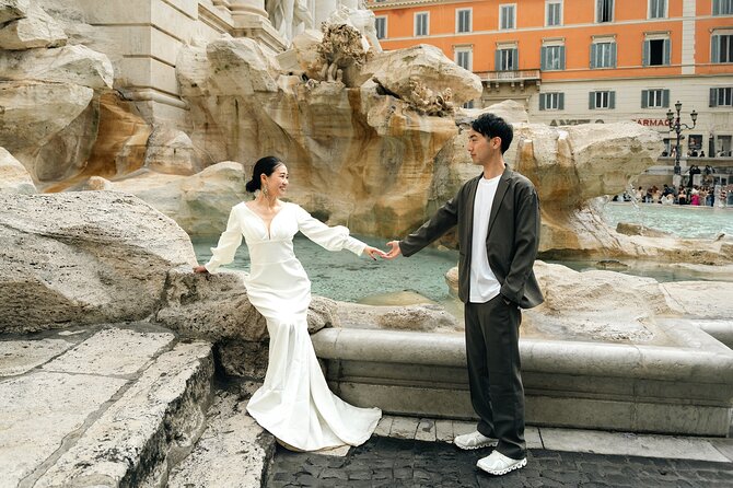 Rome: Early Morning Trevi Fountain Photoshoot & Iconic Landmarks - Trevi + Colosseum exterior portraits in about an hour