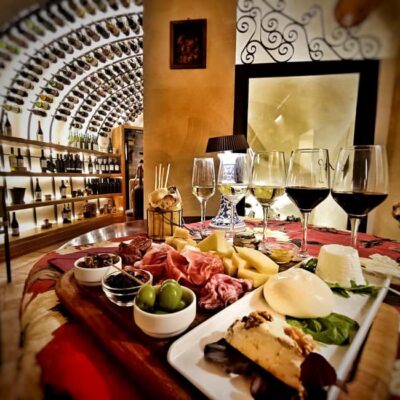 Rome: Food Tasting and Wine Pairing & Tiber River Boat Ride - Cantina Fabullus: The Roman Cistern Atmosphere That Changes the Mood