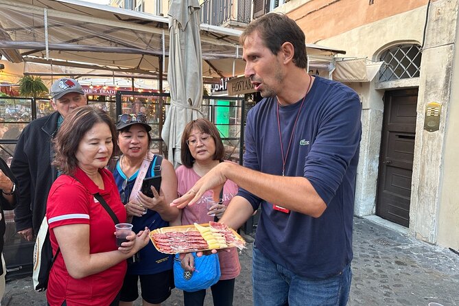 Rome Food Tour: Hidden Gems of Trastevere with Dinner & Wine - Stop 2: Street food baccalà and the story behind it