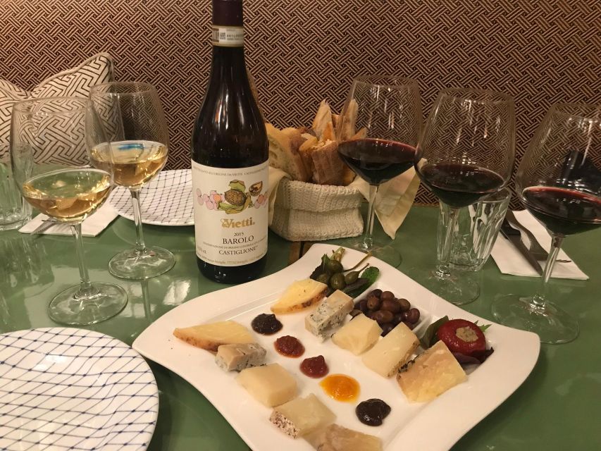 Rome: Food Tour near Vatican City with Wine - First stop: cheese, cured meats, and aged balsamic with wine