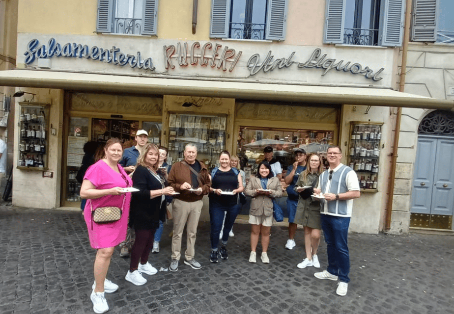Rome: Food & Wine Tour of Campo de Fiori, Ghetto, Trastevere - Jewish Ghetto groceries: fried artichoke, codfish, and local street logic