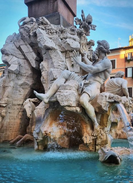 Rome: Fountains and Squares small-group guided Walking Tour - Piazza Navona: oval shape, ancient stadium roots, and the Four Rivers Fountain