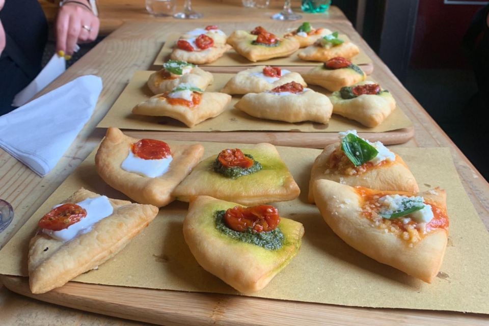 Rome: Gourmet Pizza at Sunset Near the Colosseum - The first tastings: street food snacks and a wine moment