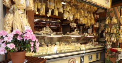 Rome: Guided Walking Tour and River Boat Ride - Santa Maria Church: gilded murals, Cavallini mosaics, and cover-up rules