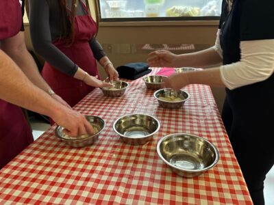 Rome: Homemade Pasta and Tiramisu Cooking Class - Finding Osteria San Giorgio and Settling Into the Kitchen