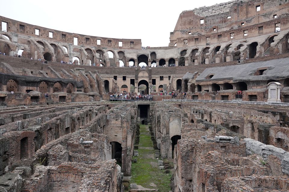 Rome: Hop-On Hop-Off Bus, Roman Forum & Colosseum Tour - Entering the Colosseum with Skip-the-Line Help