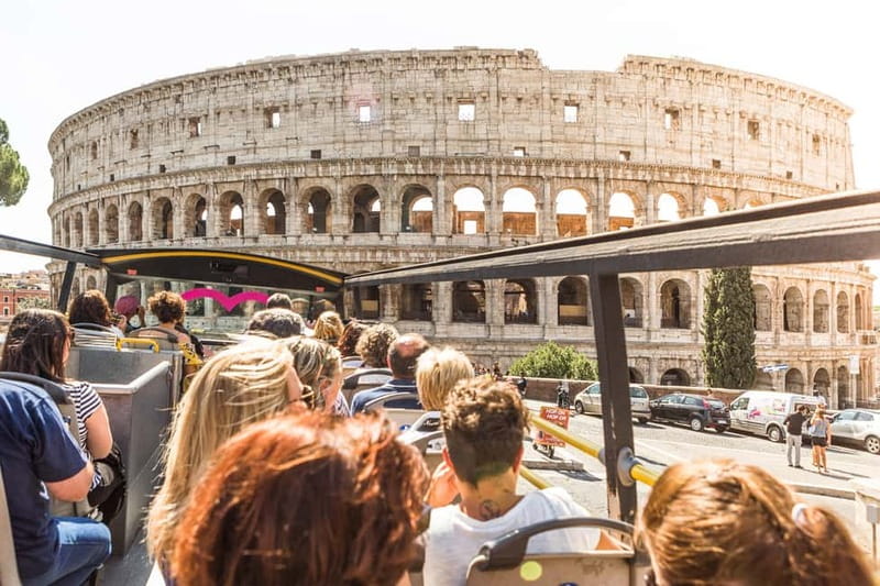 Rome: Hop-on Hop-off Sightseeing Bus Tour with Audioguide - Pink buses and audioguides: your Rome orientation plan